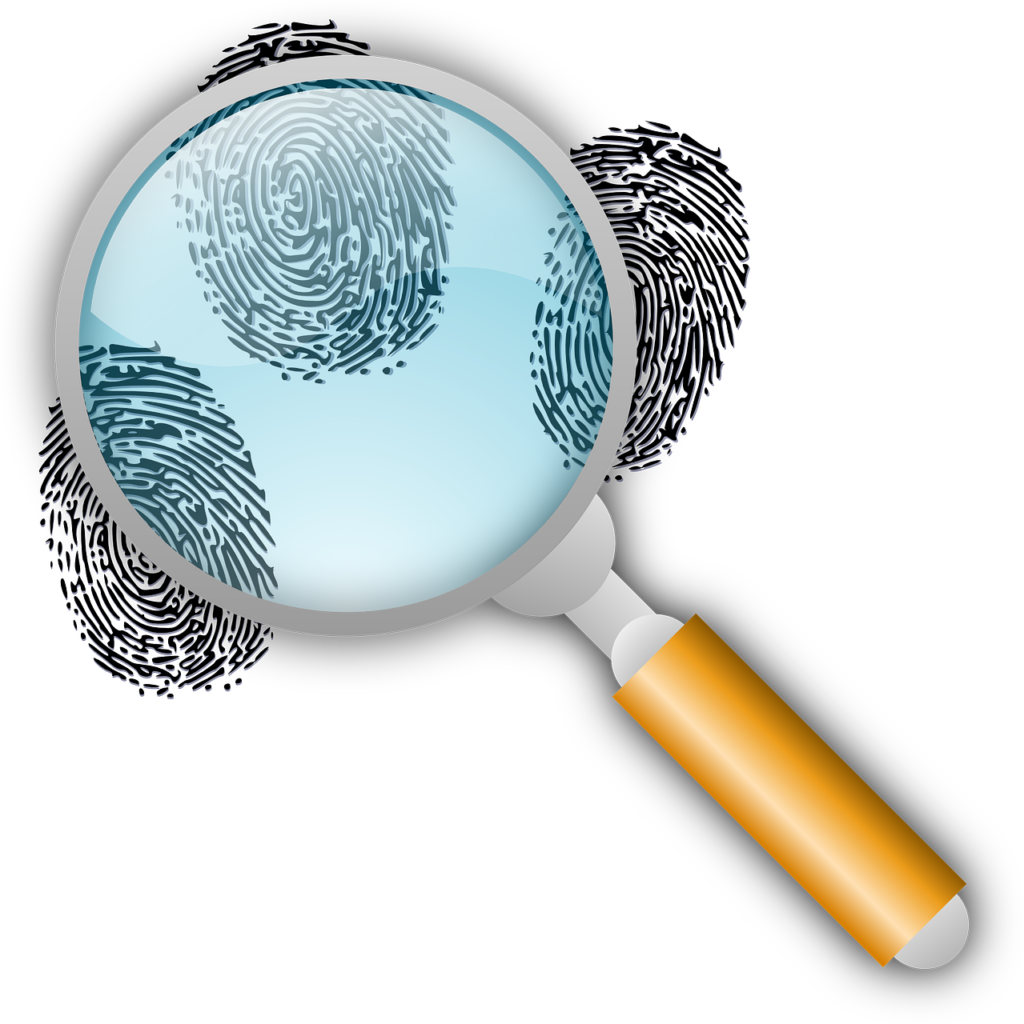 A magnifying glass with a yellow handle examines blue fingerprints on a transparent surface.